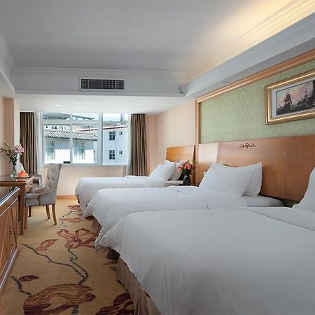 Vienna International Hotel Lijiang Yuxue Avenue Buitenkant foto