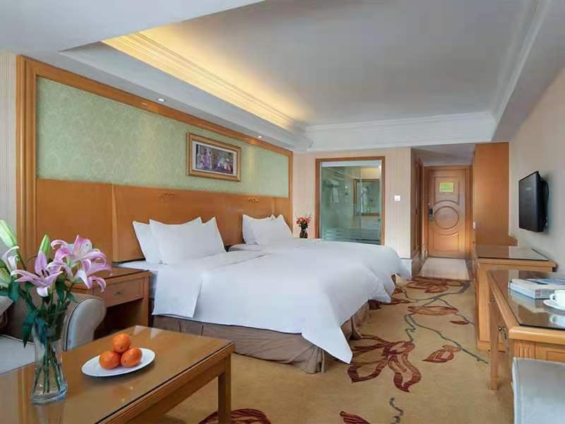 Vienna International Hotel Lijiang Yuxue Avenue Buitenkant foto